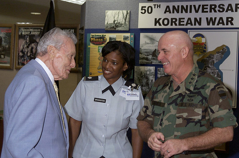 File:LTG Leon J. LaPorte, new Deputy Commanding General Forces Command, smiles as LTC Debra Broughton, Chief Protocol Officer Forces Command, introduces him to LTG Louis W. Truman (Ret), former Forces Command 010911-A-ZU786-055.jpg