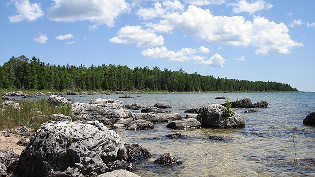 View of rocky shore of Lake Huron from east of Port Dolomite, Michigan, in the upper peninsula
