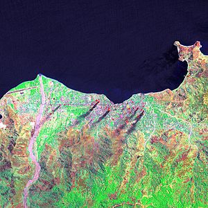 Satellite image of the bay with the city of Dili in flames (1999)