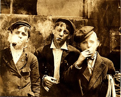 Lewis Hine, Newsies smoking at Skeeter's Branch, St. Louis, 1910