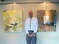 Local artist, Robert B. Reed with his work from his August '13 City Gallery exhibit, "Outlying Shores" (9457524585).jpg