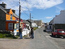 Looking east along the village street, West Town