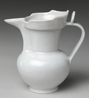 "Monk's cap ewer" with "secret" inscription (an hua) in Sanscrit; this shape was for use on altars, normally in white, and often  presented to Buddhist shrines by the emperor