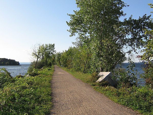 The Island Line Trail travels from Colchester across Lake Champlain to Grand Isle County; it is a former railroad line.