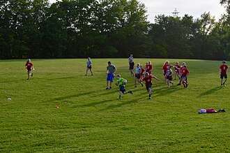 Youth playing Flag Rugby at the Conrose Park in Halifax Mini-Rugby.jpg