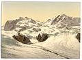 Around 1890–1900 (photomechanical print): The upper Gorner Glacier (left) obviously still is the main tributary of the lower part; the old Monte Rosa Hut (built 1894–95) would have been found just few metres above/next to the north-eastern border of the Grenzgletscher (in the middle; compare with the third picture)
