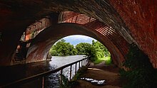 The bridges from underneath; the original is closest MoulsfordRailwayBridgeUnderside.jpg