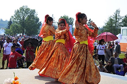 Nepalese dancers at Edmonton Heritage Festival, an example of the cultural diversity of a city.