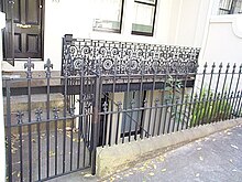 Area railing and steps on a terraced house in Australia Paddington basement.jpg