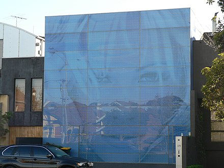 Sam Newman House features a large image of Anderson's face