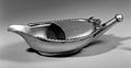 Pap boat in silver with a pierced nipple spout at one end. Wellcome M0018431.jpg