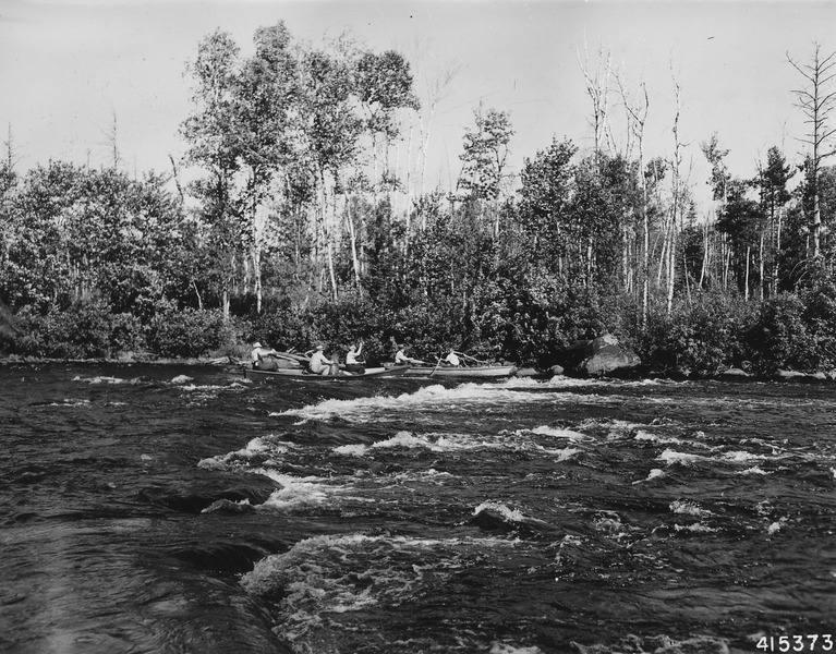 File:Photograph of Canoes Negotiating White Water on a Fishing Trip - NARA - 2129317.tif