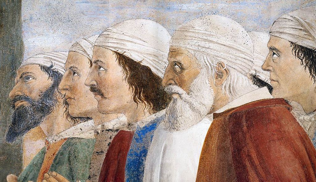 Piero della Francesca, Le Storie della Vera Croce, Esaltazione della croce, (particolare, un gruppo di uomini si inginocchia davanti alla croce), Basilica di San Francesco, Arezzo