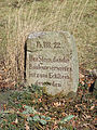 Memorial stone in front of House 1