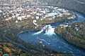 Rhine falls, with the Eglisau–Neuhausen line on the nearer bank and the Rheinfall line on the far bank