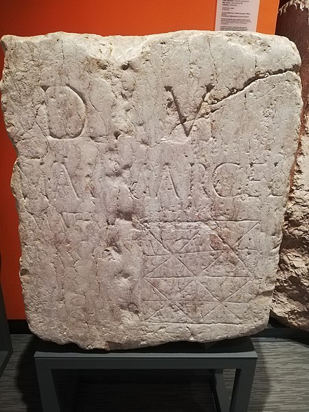 File:Roman tombstone with gameboard carved in it.jpg