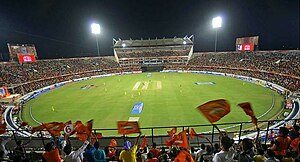 Fans cheering for SRH holding team's flags