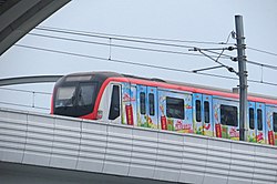 A Shenzhen Metro train wearing the Wong Lo Kat special colours to promote the product.