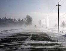 Snow blowing across a highway in Canada Snow blowing.jpg
