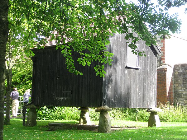 A granary sitting on staddle stones at the Somerset Rural Life Museum
