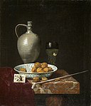 Still Life with a Pipe, Nuts, a Pitcher and a Tobacco Pouch.jpg