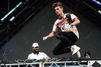 The Chainsmokers hold the record for the most number-one songs, with six. The Chainsmokers VELD 2016 (2).jpg