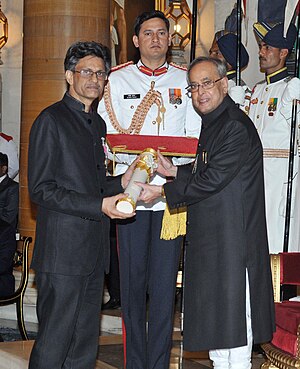 The President, Shri Pranab Mukherjee presenting the Padma Shri Award to Dr. Harsh Kumar, at a Civil Investiture Ceremony, at Rashtrapati Bhavan, in New Delhi on March 30, 2015.jpg