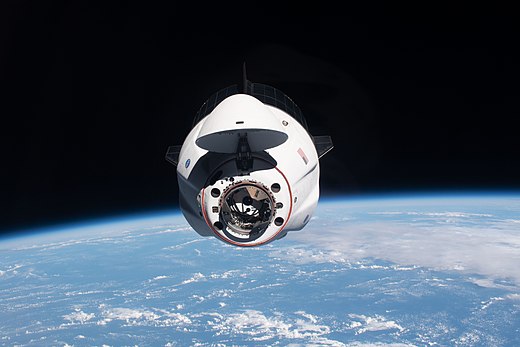 SpaceX's Crew Dragon capsule approaching the International Space Station in Earth orbit
