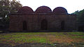 Triple domed mosque within Kurumbera fort premises.jpg
