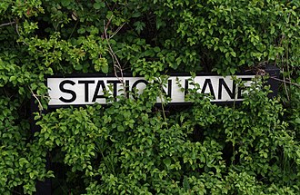 The road name is one of the only indications of the station. Tytherington MMB 02 Station Lane.jpg