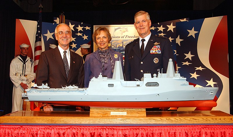 File:US Navy 040909-N-2568S-003 The Secretary of the Navy Gordon England, and the Chairman, Joint Chiefs of Staff Gen. Richard Myers, joined by his wife Mary Jo Myers, pose next to a model of a San Antonio-class amphibious dock land.jpg