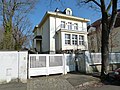 Villa with a fence including an enclosure wall on Lauterbacher Strasse