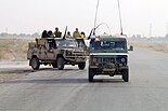 Honker Skorpion-3 and a ZWD-3 command vehicle based on a Honker in Iraq during the حرب العراق