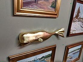 (John Pydynkowski) made this.. hand carved. a custom made to order. estimated to have 175 u.s.d. cost on gold leaf... sold for 350 u.s.d. Gold Whale.jpg