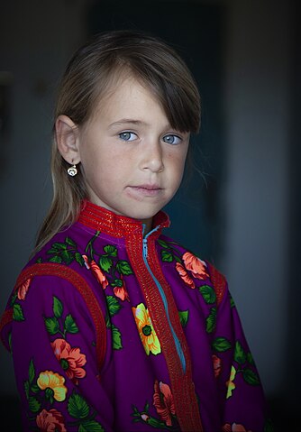 A young Yörük girl wearing traditional clothing in the village of Prnalija