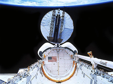 The Syncom IV-F5 satellite is deployed.