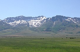2014-06-11 15 27 42 View barat menuju Lubang di Puncak Gunung Nevada State Route 232 (Clover Valley Road) 6.1 km sebelah utara dari ujung selatan di Clover Valley, Nevada-cropped.jpg