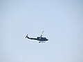 2018-03-22 (205) Bell 212 from Austrian Air Force over Bahnhof Langenlebarn.jpg