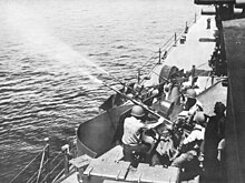 Biloxi's 20 mm guns firing, c.1944 20 mm Oerlikons aboard USS Biloxi (CL.80) firing c1944.jpg