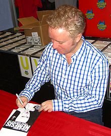 Writer Mark Millar signing a copy of the book during an appearance at Midtown Comics in Manhattan. 4.25.13MarkMillarByLuigiNovi45.jpg