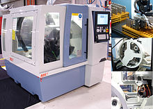 A modern CNC tool grinder with automatic wheel pack exchanger and tool loading capabilities. ANCA MX7 CNC Tool Grinder.jpg