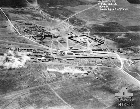 Aerial photograph of air raid on Afulah railway on 19 September 1918. Road to Nazareth in top left corner