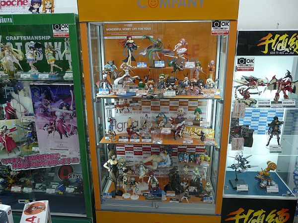 Display case in Japan featuring typical anime/manga action figures and figurines