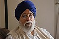 * Nomination: Amarjit Chandan at his residence in London in July 2022. --Satdeep Gill 05:18, 30 September 2022 (UTC) * Review Too dark, and I find the reflexion in the glasses disturbing --Poco a poco 06:58, 30 September 2022 (UTC)