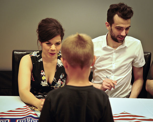 Baruchel and his How to Train Your Dragon co-star America Ferrera signing autographs during a USO tour on June 4, 2014, at Joint Base McGuire-Dix-Lake