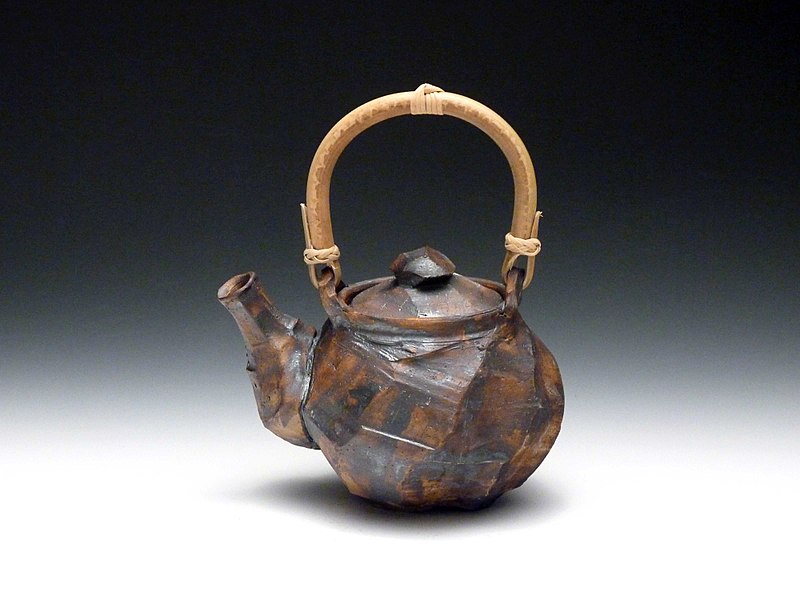 File:Black Glaze Facet Teapot With Bamboo Handle.jpg