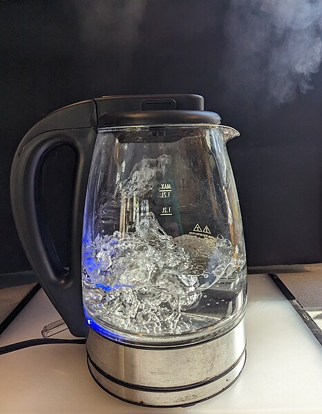 Rolling boil of water in an electric kettle