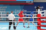 Deutsch: Boxen bei den Olympischen Jugendspielen 2018 Tag 12, 18. Oktober 2018 - Finale Leichtgewicht Mädchen – Oriana Saputo (Argentinien, blau) schlägt Emma Lawson (Australien, rot) 5-0; Ringrichter ist José Romero (Spanien). English: Boxing at the 2018 Summer Youth Olympics on 18 October 2018 – Girls' lightweight Bronze Medal Bout – Oriana Saputo (Argentina, blue) wins over Emma Lawson (Australie, red) 5-0; Referee is José Romero (Spain). Español: Boxeo en los Juegos Olímpicos Juveniles de Verano de 2018 en 18 de octubre de 2018 - Combate de medalla de bronce de las niñas: Oriana Saputo (Argentina, azul) gana a Emma Lawson (Australie, roja) 5-0; Árbitro es José Romero (España).