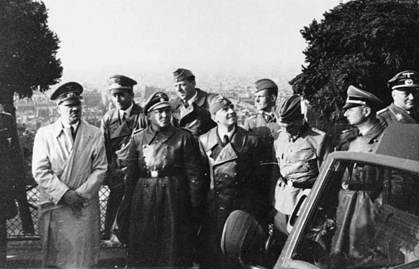 Bormann (in front beside Hitler) in Paris, June 1940