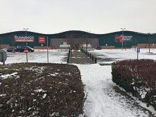 Bunnings Warehouse in Worle, a Homebase store converted under Wesfarmers' ownership. Bunnings Warehouse Weston super Mare.jpg